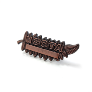 NZ Clay Target Association bronze fern badge