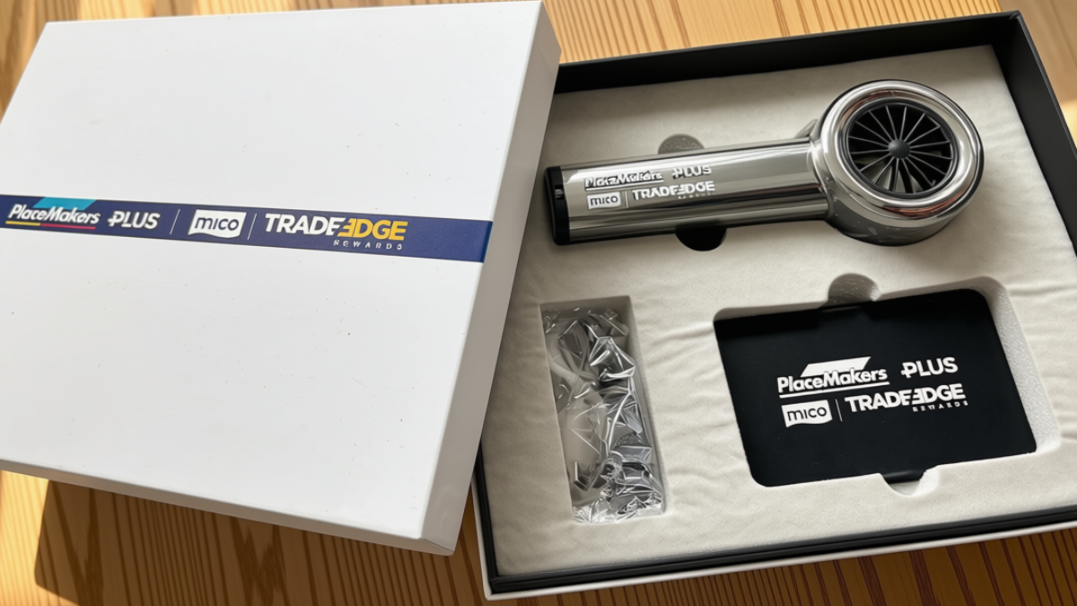 Custom branded corporate gift box with an engraved chrome handheld fan, keyring and logo card